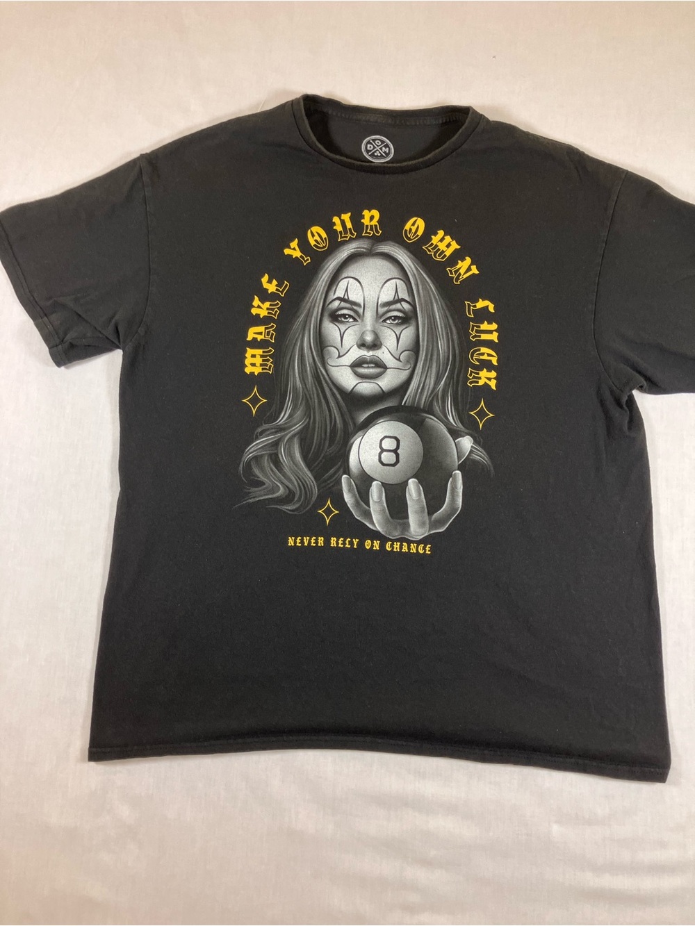 Black Graphic Tee with 8-Ball Portrait and Yellow Accents